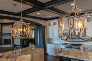 Preissless Design Interior Design - Lake Oconee property - - lighting in kitchen - photography by Solia Media