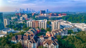Solia Media Best Drone Services Atlanta - Heritage Place Condos Buckhead Atlanta with Atlanta Skyline in Background