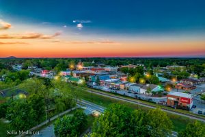 Olde Town Conyers Aerial Image by Solia Media - Evening Showing Stone Mountain