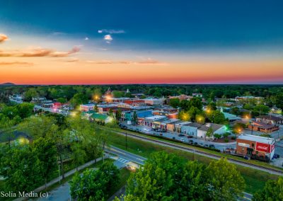 Olde Town Conyers Aerial Image by Solia Media - Evening Showing Stone Mountain